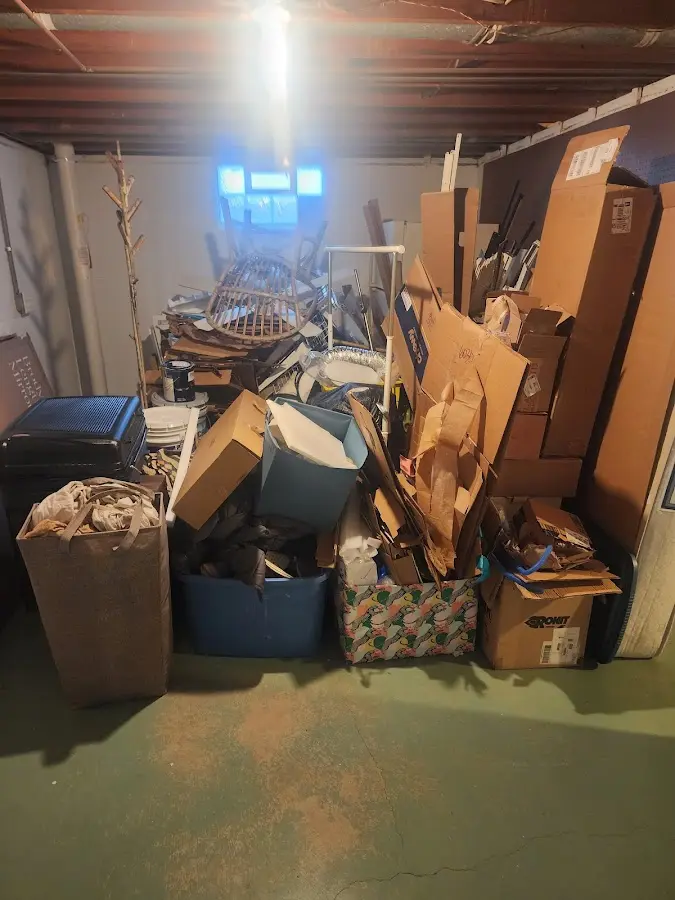 Roll-off dumpster container at job site for 20 Yard Dumpster Rental in Lloyd Harbor